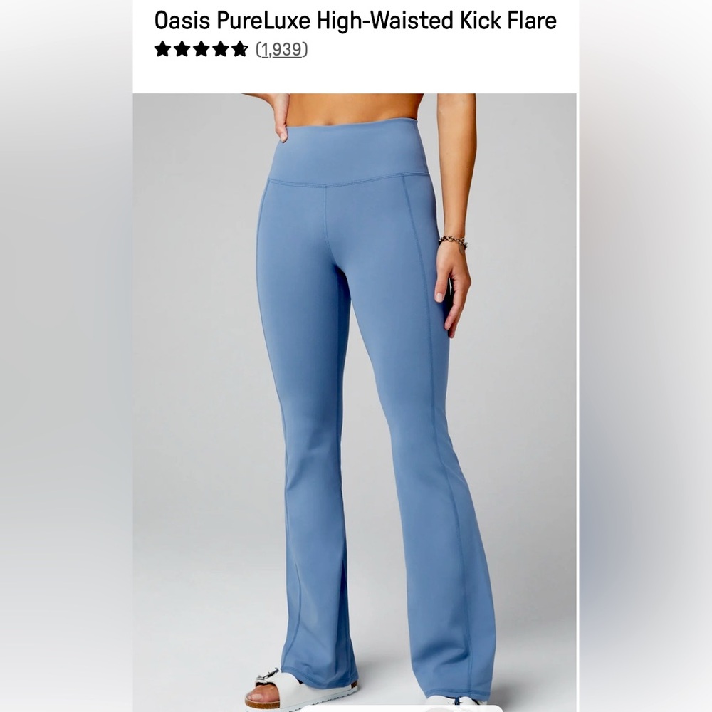Fabletics High-Waisted Kick Flare Legging in light blue